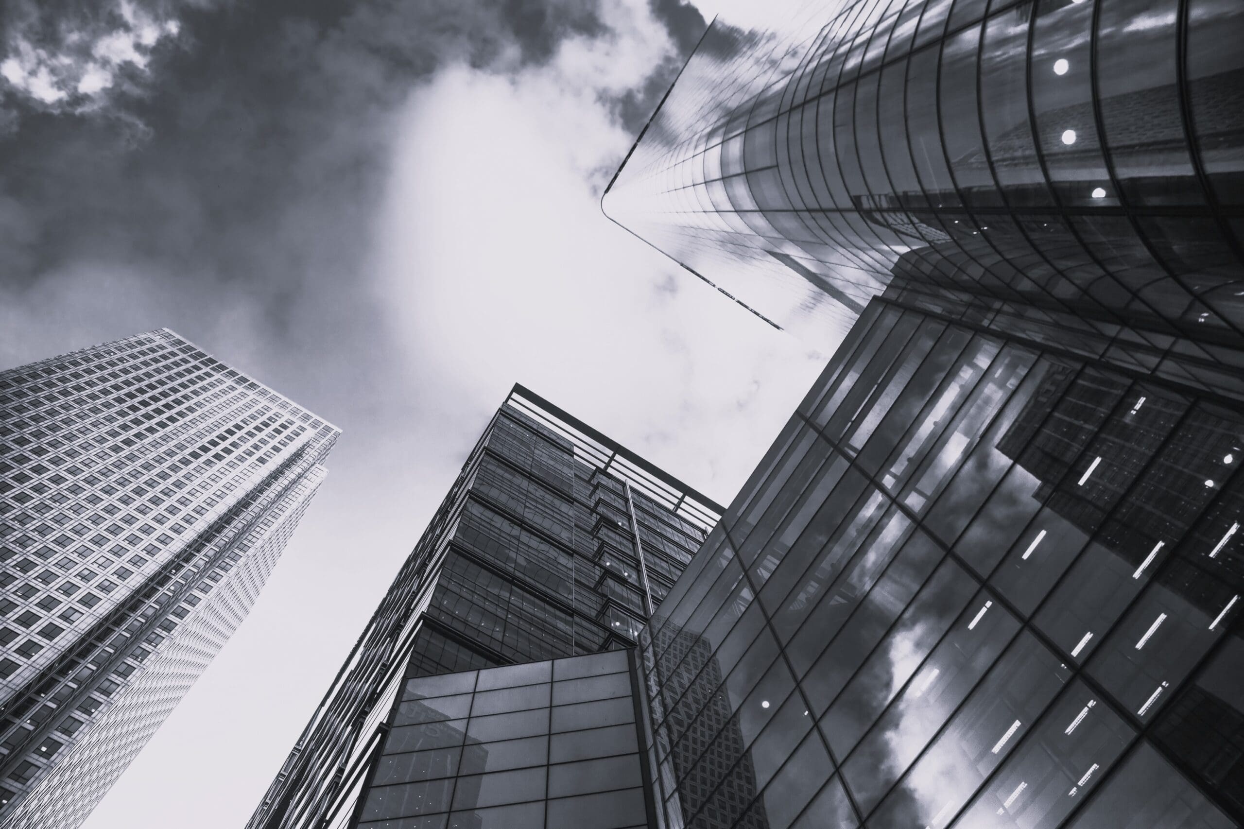 glass façade of tall skyscraper business buildings